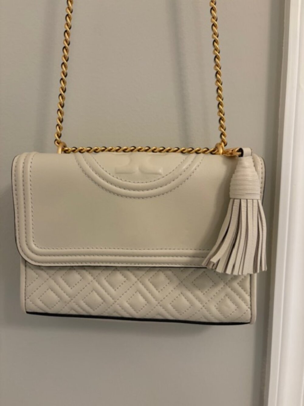 Cream Quilted Shoulder Bag with Gold Chain and Tassel